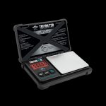 Digital scale with a stainless steel weighing platform, used for measuring cannabis or other small quantities.