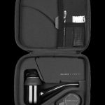 Black carrying case open, displaying a Puffco Proxy cannabis vaporizer and accessories.