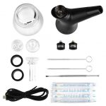 Cannabis dab rig kit including a water pipe, carb cap, quartz banger, dab tool, silicone rings, alcohol swabs, and USB charging cable.