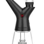 Black electric dab rig with a glass water chamber and coil.