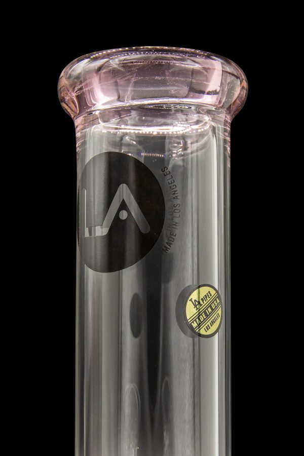 Pink glass water pipe with a black logo and “Made in Los Angeles” text.