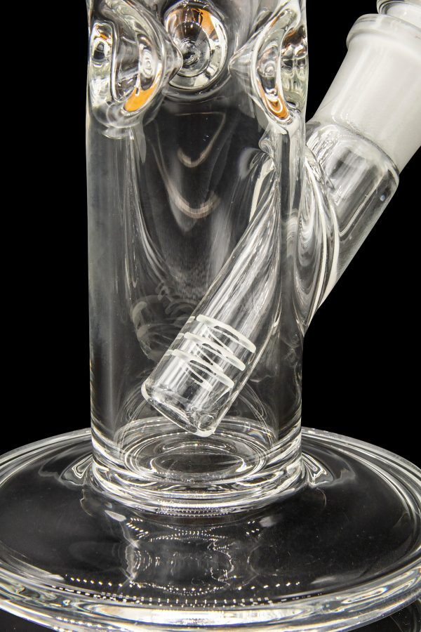 Clear glass water pipe (bong) with intricate swirling patterns and a diffused downstem, isolated on a black background.