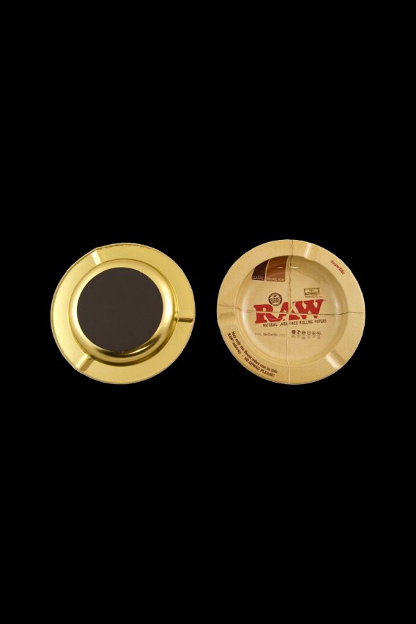 Gold metal grinder with a RAW rolling papers design.