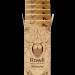Stack of Rowll unbleached rolling paper booklets with an owl logo.