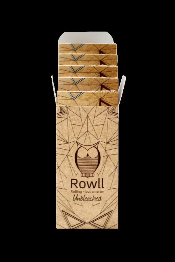 Stack of Rowll unbleached rolling paper booklets with an owl logo.