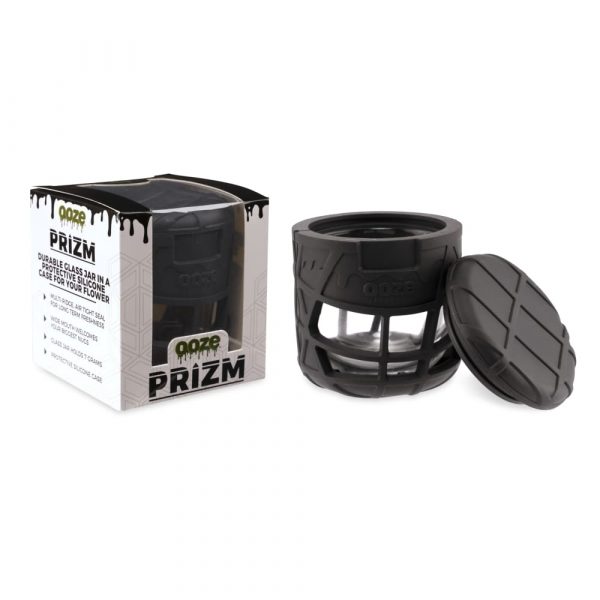 Black silicone cannabis jar with a glass insert, branded “Ooze PRISM” and displaying capacity details.