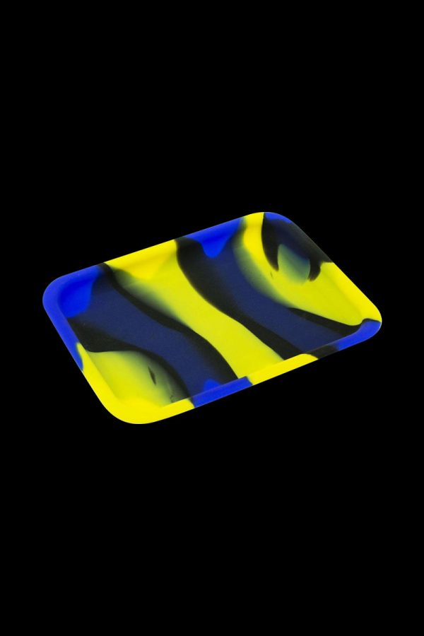 A top-down view of the Silicone Concentrate Tray, showcasing its smooth, dark surface against a black background.