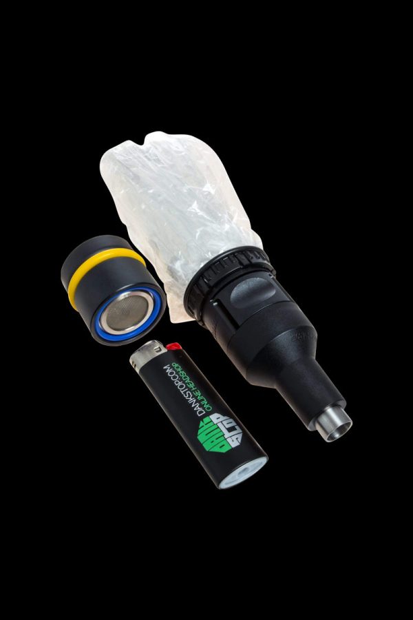 Close-up of the Volcano Solid Valve Starter Set, displaying its black valve components and glass connector.