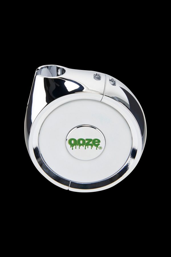 Chrome Ooze vape cartridge battery with green logo.