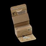 A package of "Blazy Susan" ultra-thin, 8-meter hemp rolling papers and 50 tips, featuring a cartoon woman with a bandana.