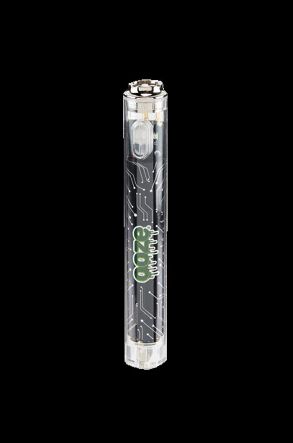Clear glass cannabis oil rig with green graphic detailing.