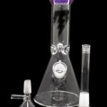 Glass bong with detachable downstem and bowl, isolated on a black background.