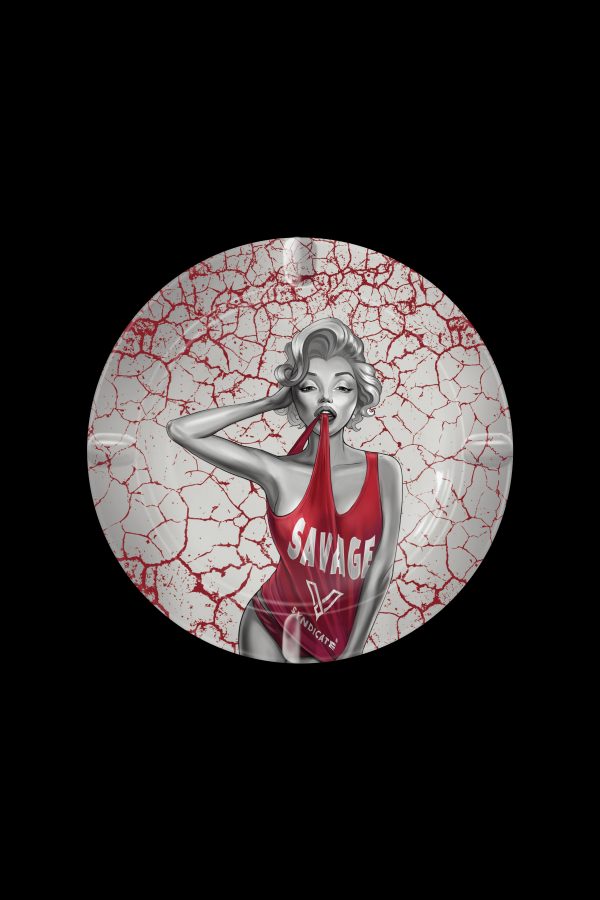 Round sticker featuring a stylized Marilyn Monroe illustration wearing a red tank top with "SAVAGE" and a cannabis leaf design, set against a cracked red background.