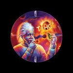 A round glass smoking plate depicts Albert Einstein with glowing hair, smoking a pipe and holding a cannabis bud, overlaid with the equation “T=HC²” in a psychedelic, colorful style.