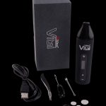 Vital Max cannabis vaporizer pen kit with charging cable, tools, and oil cartridges.