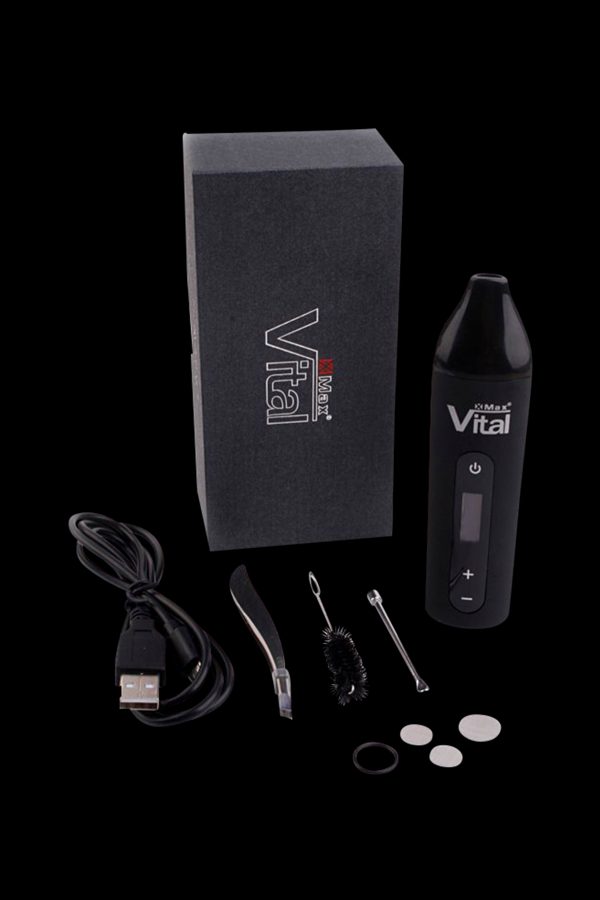 Vital Max cannabis vaporizer pen kit with charging cable, tools, and oil cartridges.
