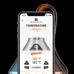 A digital display shows the settings for the Storz & Bickel Volcano Hybrid Desktop Vaporizer, viewed from a slightly angled perspective.