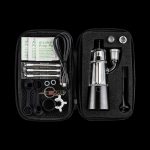The XVAPE Vista Mini 2 Electronic Dab Rig is displayed open within its carrying case, revealing its components and a small alcohol prep pad.