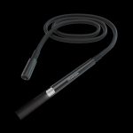 Clear glass cannabis oil rig with coiled tubing against a black background.