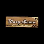 Pack of Blazy Susan 1 ¼ size premium rolling papers against a black background.