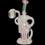 Clear glass dab rig with pink accents and a quartz banger.