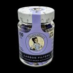 Jar of "Blazy Susan" carbon filters for cannabis smoking, with colorful label and 100 filters per jar.