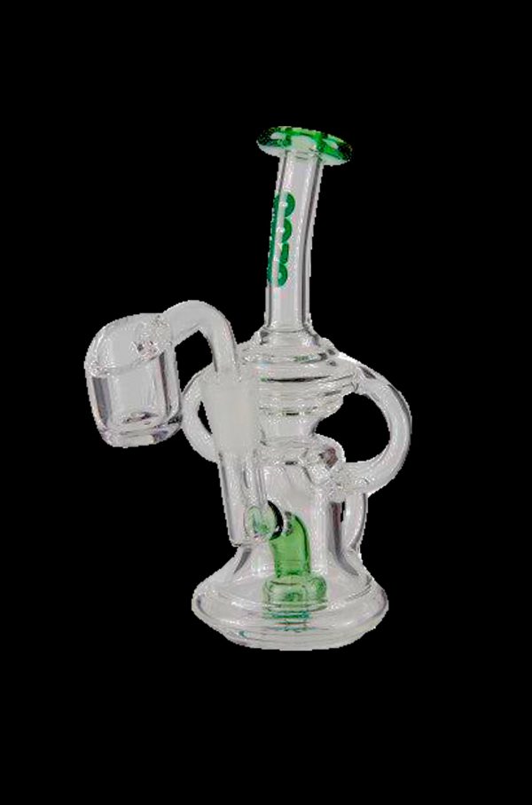Clear glass dab rig with green accents and a quartz banger.