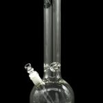 Clear glass water pipe (bong) with intricate swirling patterns and a diffused downstem, isolated on a black background.