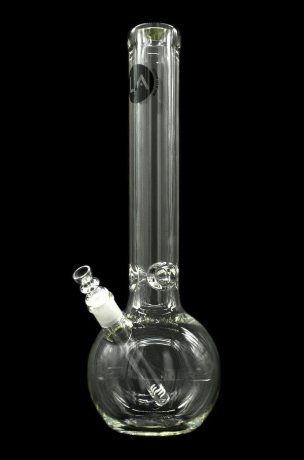 Clear glass water pipe (bong) with intricate swirling patterns and a diffused downstem, isolated on a black background.
