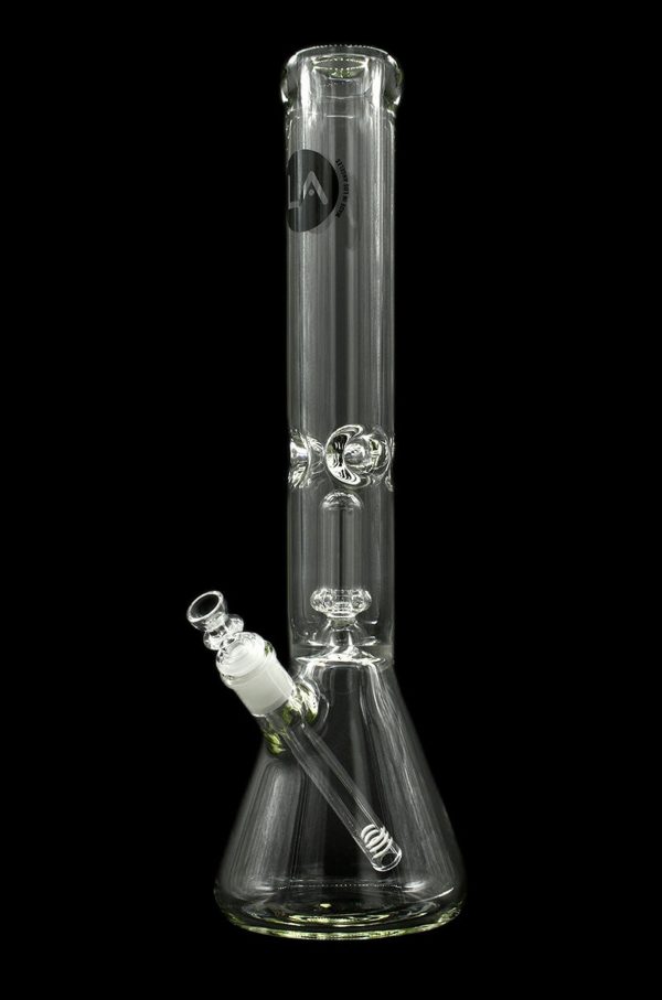 Clear glass bong with intricate detailing and a green accent, isolated on a black background.